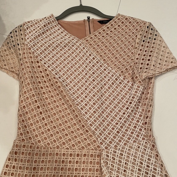 Never Worn BCBGMaxazria peplum top - Picture 2 of 3